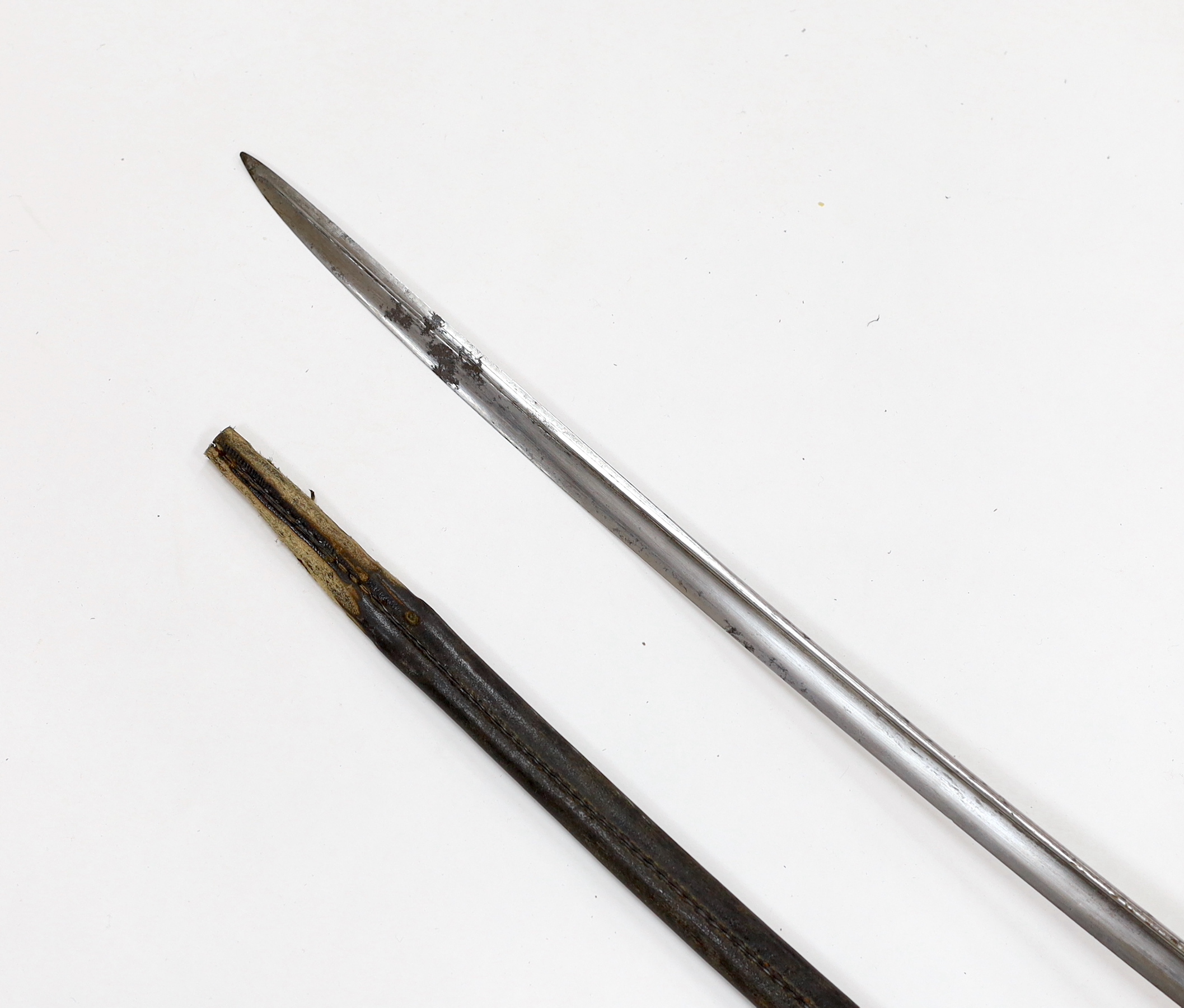 A William IV infantry officer’s sword, in a leather scabbard, blade 72.5cm